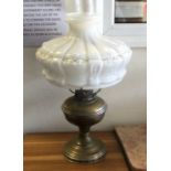An old white lustre oil lamp and shade. Est. £30 -