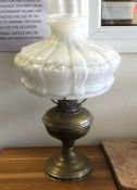 An old white lustre oil lamp and shade. Est. £30 -