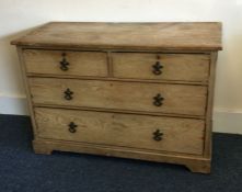 An ash chest of four drawers on bracket feet. Est.