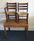 Two children's chairs together with a stripped pin
