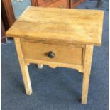 A stripped pine single drawer table. Est. £40 - £6