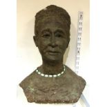 A large life-sized bust of a lady of textured form