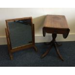 A mahogany drop leaf pedestal table together with