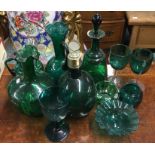 A large collection of green glass. Est. £30 - £50.