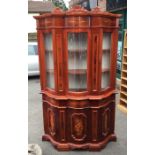 A reproduction glazed display cabinet. Est. £20 -