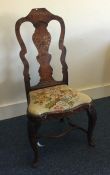 A Dutch hall chair with inlaid decoration. Est. £3