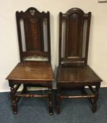 Two early Georgian oak chairs with panelled seats