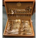 An extensive gold plated cutlery service in box. E