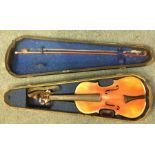 An old cased German violin. Est. £30 - £50.