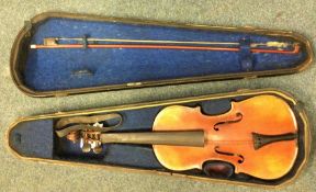 An old cased German violin. Est. £30 - £50.