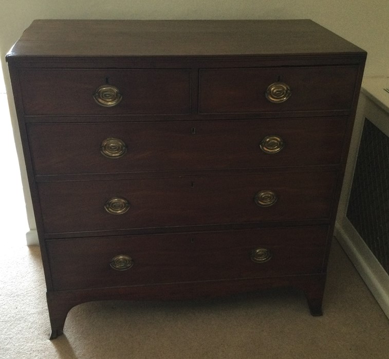 A large mahogany five drawer Georgian chest of dra