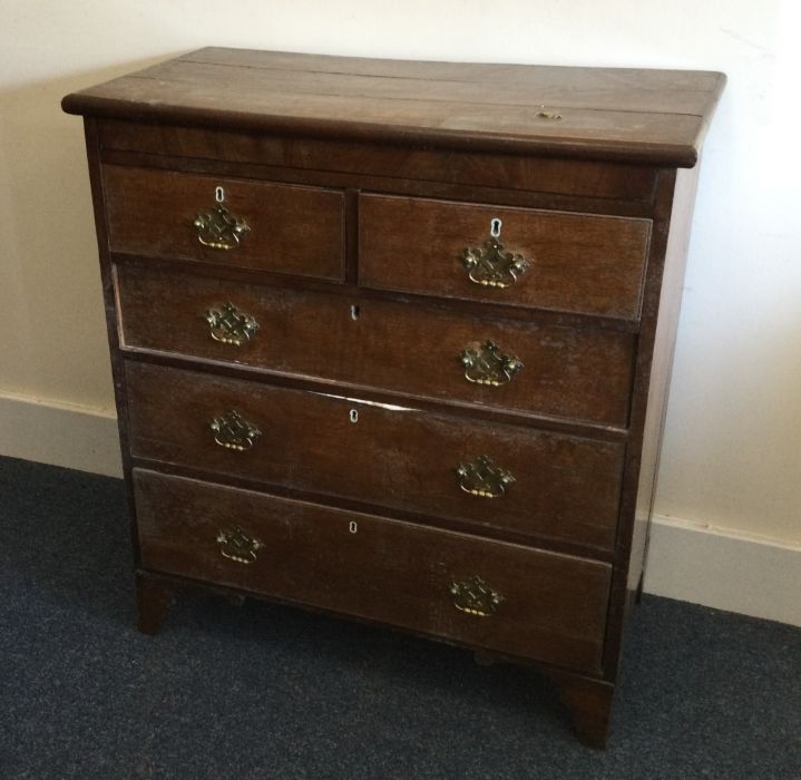 A Georgian oak chest of five drawers with panelled - Image 2 of 2