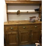 A large pine three drawer kitchen dresser. Est. £3