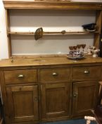 A large pine three drawer kitchen dresser. Est. £3