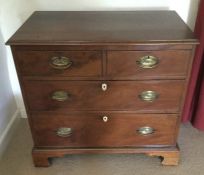 A good Antique mahogany four drawer chest on shape