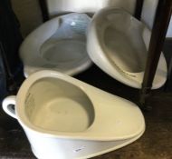 A 'Perfection' porcelain bed pan together with two