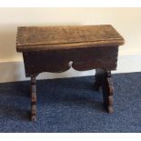 A small oak stool with carved decoration. Est. £20