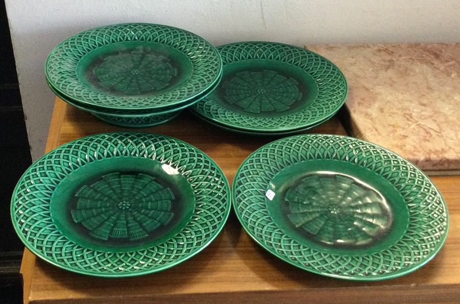 A six piece Majolica dessert service in green. Est