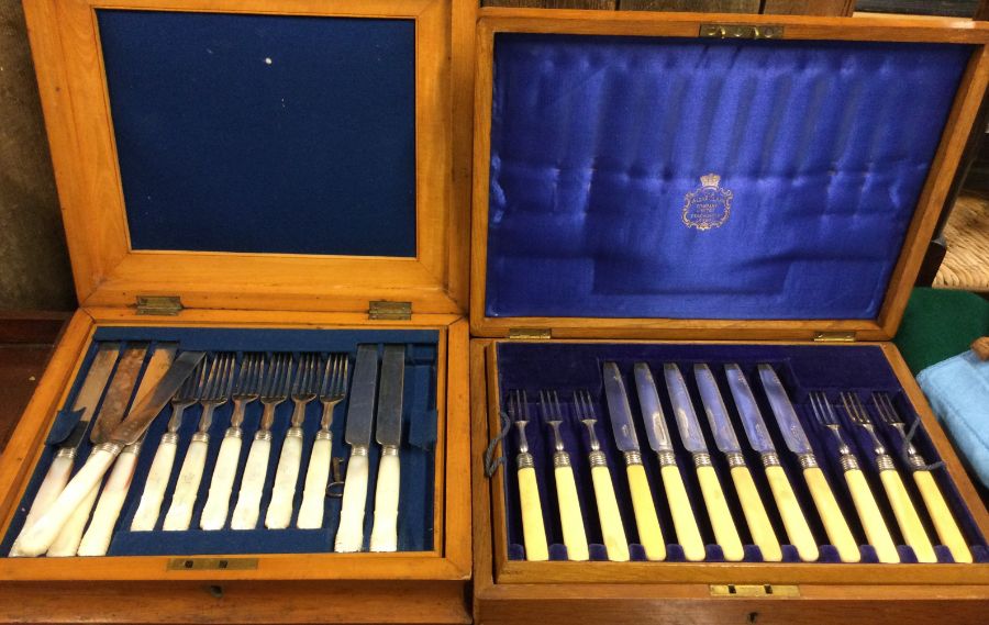 Two cased sets of silver plated cutlery. Est. £20