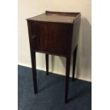 A good Georgian mahogany pot stand with hinged doo