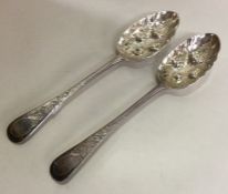 A pair of large silver berry spoons. London 1880.