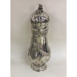 A Continental silver sugar caster of baluster form