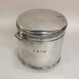 A good quality cast silver hinged top biscuit box