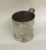 NEWCASTLE: A good Georgian silver mug on reeded ba