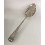 A George III silver berry spoon. London. By Eley &