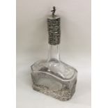 An attractive Continental silver and glass scent b
