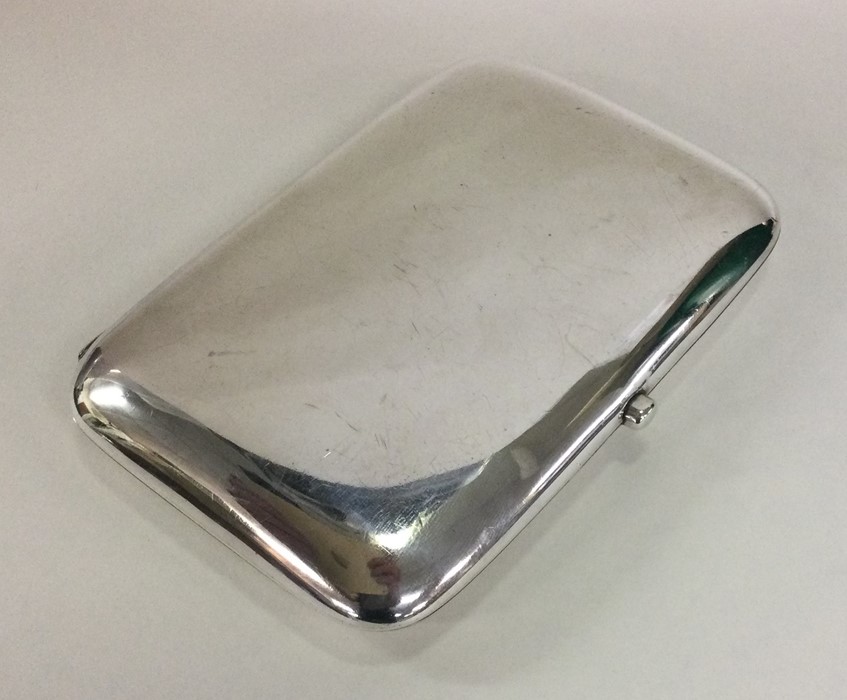 A large Edwardian silver cigarette case. London 19