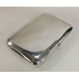 A large Edwardian silver cigarette case. London 19