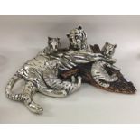 A heavy silver mounted figure of a tiger together