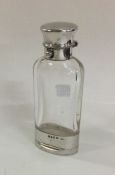 A good glass and silver mounted scent bottle / vin