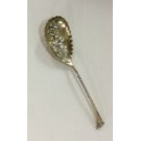 An unusual silver preserve spoon with twisted stem