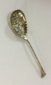 An unusual silver preserve spoon with twisted stem