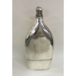 A large and impressive George III silver hip flask