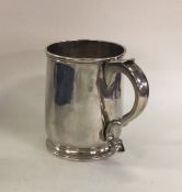 A fine George I silver tapering mug on pedestal fo