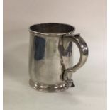 A fine George I silver tapering mug on pedestal fo