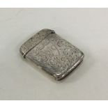An engraved silver vesta case with hinged top. App