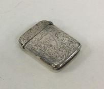 An engraved silver vesta case with hinged top. App