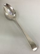 A Georgian OE pattern silver tablespoon. London 17