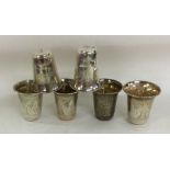 A good set of six silver spirit tots with engraved