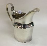 A heavy George III silver cream jug. London 1798.