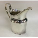 A heavy George III silver cream jug. London 1798.