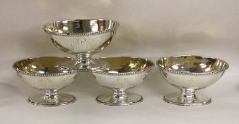 A good heavy set of four Georgian silver salts dec