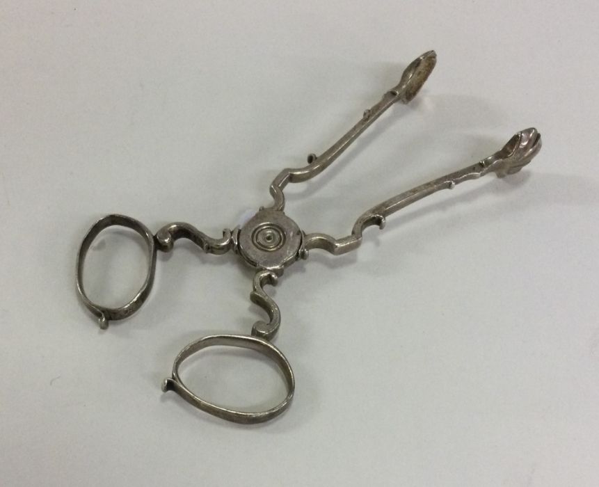 A pair of Georgian silver sugar scissors of typica