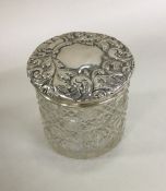 A hobnail cut silver top dressing table jar. Chest