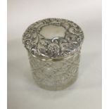 A hobnail cut silver top dressing table jar. Chest