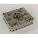 An unusual silver snuff box attractively decorated